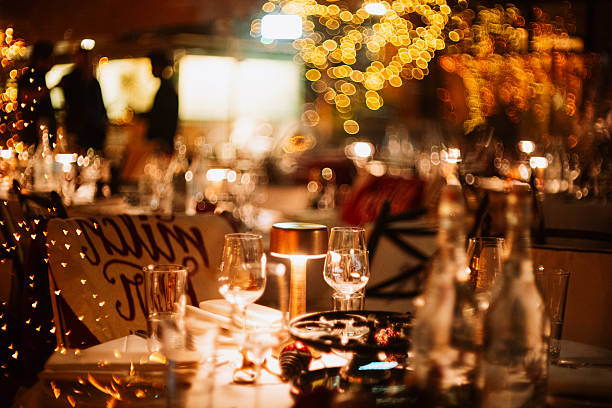 istock Set, empty, festive dinner table with bokeh lights. Moody, romantic atmosphere, very shallow depth of field, no people 2249722815