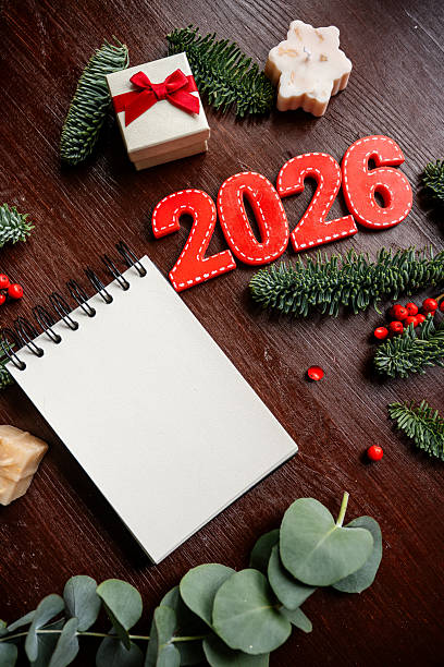 istock Planning New Year 2026 resolutions on wooden background 2249723984
