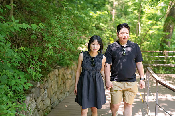 istock A man and woman are walking together on a path 2249726778