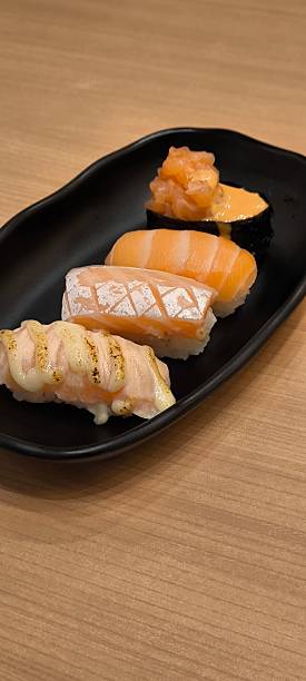 istock Sushi on a black plate Japanese food 2249728801