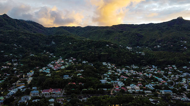 istock Tropical Townscape and Forested Mountain Peak at Dusk 2249730207