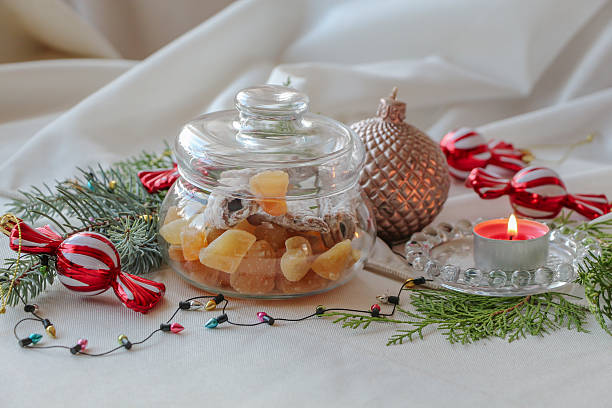 istock Festive Ginger Snacks in Glass Jar with Candle and Ornaments 2249731876