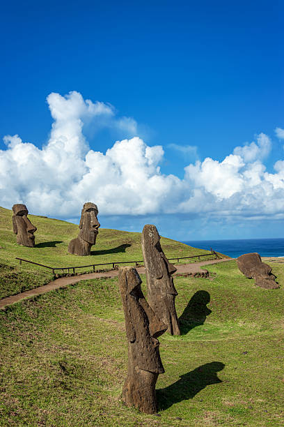 Moai statues with visitors at the Rano Raraku quarry on Easter Island, Rapa Nui, Chile