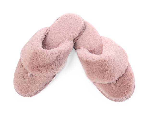 istock Pair of pink soft slippers isolated on white, above view 2249740483