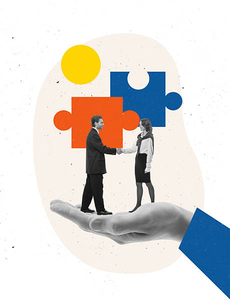 istock Creative digital artwork. Business handshake supported by large hand and puzzle pieces symbolizing trust 2249740503