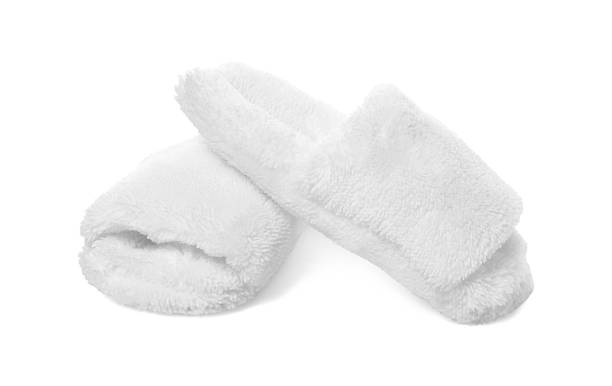 istock Pair of soft slippers isolated on white 2249740549