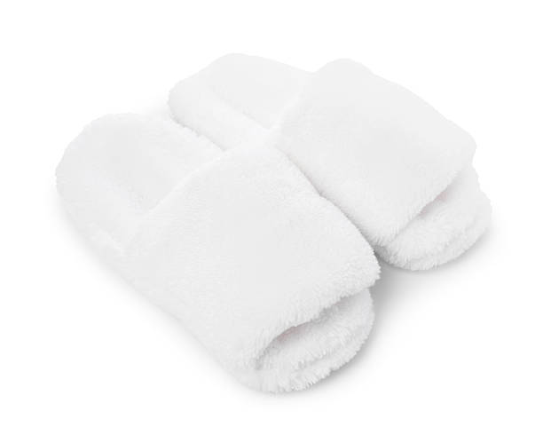istock Pair of soft slippers isolated on white 2249740863