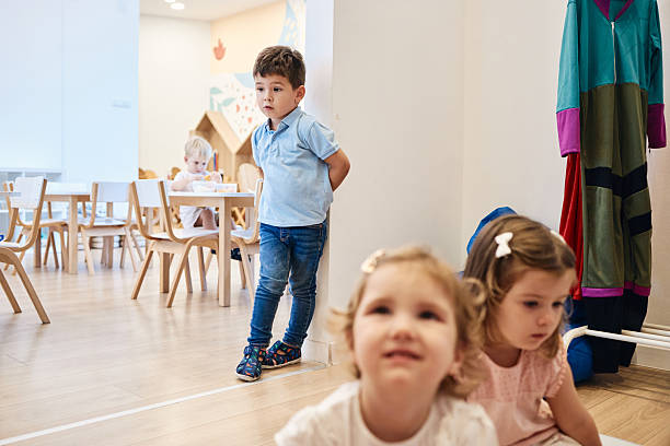 istock Children playing in a nursery school classroom 2249742430