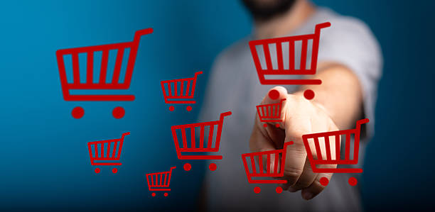 istock Person interacting with digital shopping carts, representing onl 2249742532