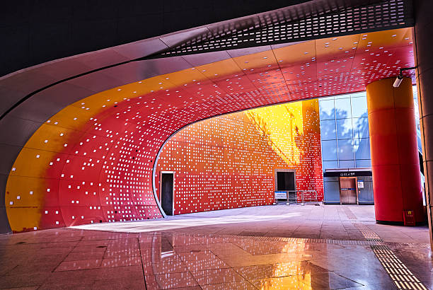 Optics Valley Square Station serves as a major interchange hub within Wuhan's metro network, distinguished by the following key features:‌Vast Circular Concourse‌: As Wuhan's first station featuring a 360-degree circular design, its concourse spans an expansive 31,400 square metres, earning recognition as one of Asia's largest underground stations.‌‌Distinctive directional signage:‌ The station employs an innovative circular angle indicator system to guide passengers towards exits, replacing conventional ‘left turn’ or ‘right turn’ prompts.‌‌Cultural-themed decoration: The concourse is adorned with motifs inspired by the Five Elements of traditional Chinese culture – Metal, Wood, Water, Fire, and Earth – distinguished by five distinct colours, creating a unique visual experience.‌‌Crucial interchange function: Serving as a transfer point for Lines 2 and 11 (with future plans for Line 9), the station connects Wuhan's Optics Valley district with the wider city.