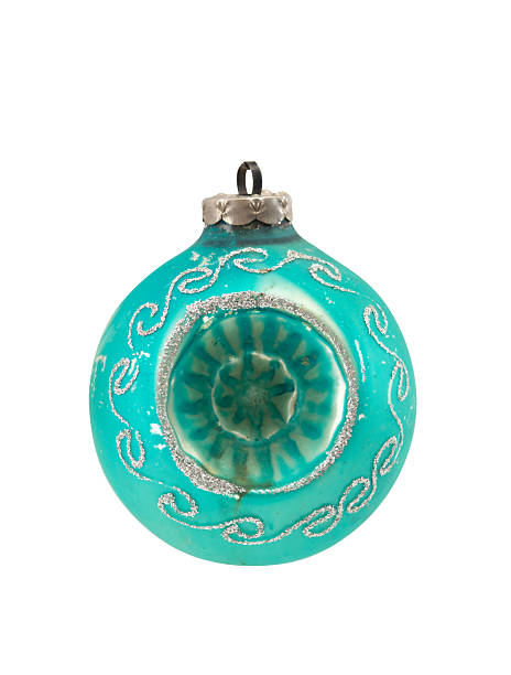 Vintage glass Christmas ball ornament: turquoise teal sphere with silver glitter scrollwork and recessed center, isolated on white.
