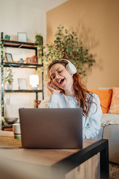 istock Woman working from home singing loudly during video call 2249745685