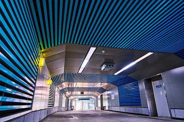 Optics Valley Square Station serves as a major interchange hub within Wuhan's metro network, distinguished by the following key features:‌Vast Circular Concourse‌: As Wuhan's first station featuring a 360-degree circular design, its concourse spans an expansive 31,400 square metres, earning recognition as one of Asia's largest underground stations.‌‌Distinctive directional signage:‌ The station employs an innovative circular angle indicator system to guide passengers towards exits, replacing conventional ‘left turn’ or ‘right turn’ prompts.‌‌Cultural-themed decoration: The concourse is adorned with motifs inspired by the Five Elements of traditional Chinese culture – Metal, Wood, Water, Fire, and Earth – distinguished by five distinct colours, creating a unique visual experience.‌‌Crucial interchange function: Serving as a transfer point for Lines 2 and 11 (with future plans for Line 9), the station connects Wuhan's Optics Valley district with the wider city.