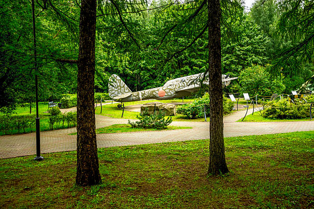Outdoor Display Of Camouflaged WWII Propeller Aircraft In Lush Green Garden In Victory Park, Moscow, Russia, 10 August 2025