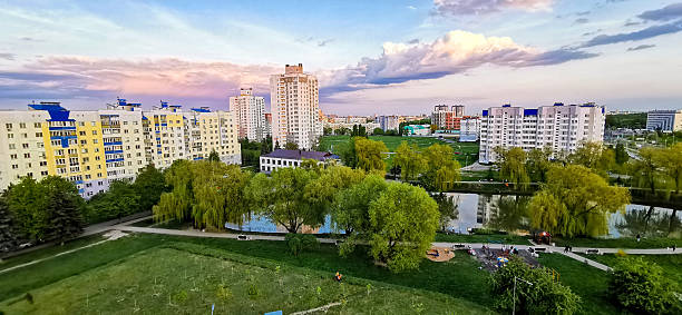 Urban buildings by the lake in the morning park in Ningbo, Zhejiang Province, China