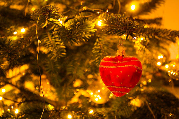 istock Red heart-shaped Christmas ornament 2249756989