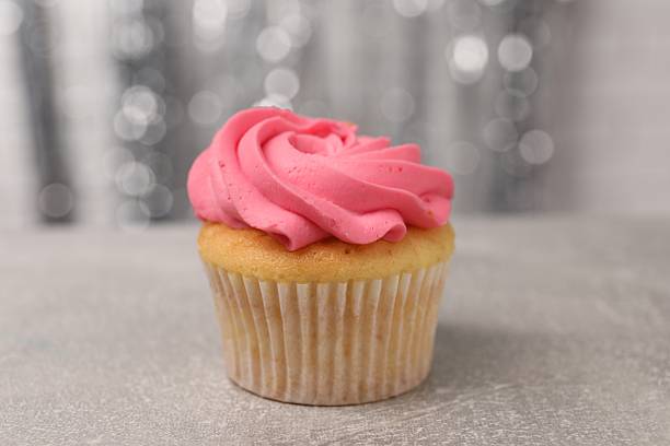 istock Delicious cupcake with bright cream on grey table, closeup 2249758460