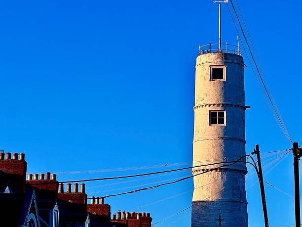 Blue sky and white lighthouse