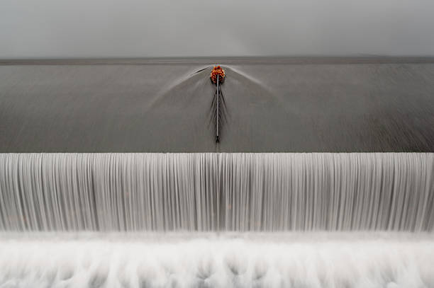 Azud is a construction made to raise the water level of a stream or river in order to divert part of the flow to irrigation ditches or other supply pipelines.