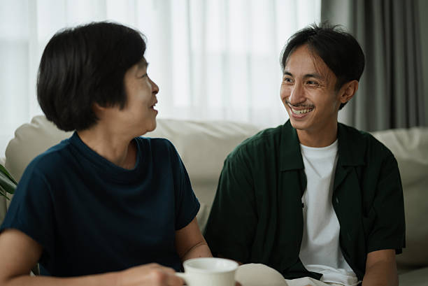 istock Adult son and mother relaxing and talking. 2249763755