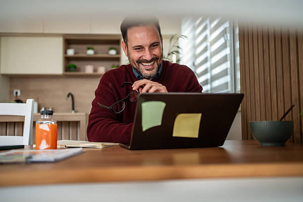 istock Happy man having online meeting working from home 2249766302