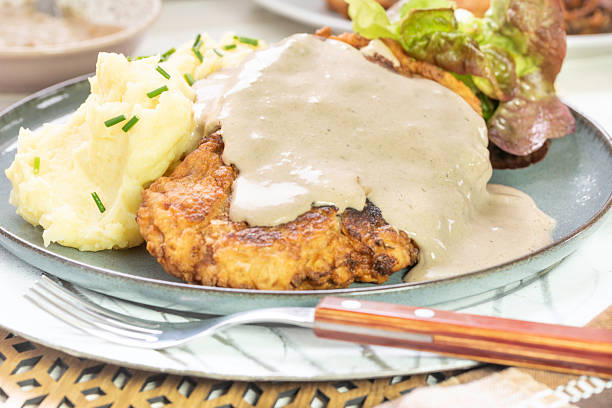 istock Ribeye chicken fried steak with creamy sauce 2249768928