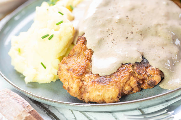 istock Ribeye chicken fried steak with creamy sauce 2249768978