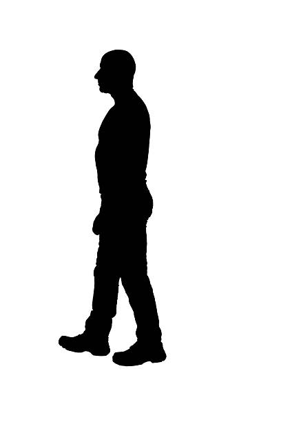istock silhouette of   side view of a man walking on white background 2249771404