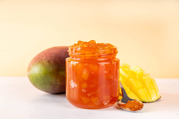 istock Golden mango marmalade jam with fresh mango fruits 2249771481