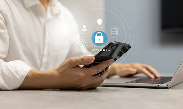 istock close up man hand use digital tablet to access account on social media network website with virtual icon of GDPR for security personal information concept 2249772842