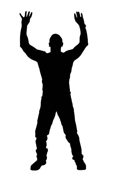 istock silhouette of  front view of a standing man holding or pushing something imaginary upwards. 2249773487