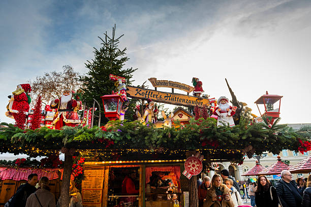 Karlsruhe, Germany - November 29, 2025: Colorful christmas market with many illuminated huts in Karlsruhe.