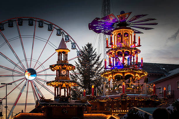 Karlsruhe, Germany - November 29, 2025: Colorful christmas market with many illuminated huts in Karlsruhe.