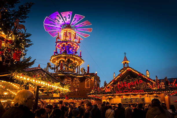Karlsruhe, Germany - November 29, 2025: Colorful christmas market with many illuminated huts in Karlsruhe.