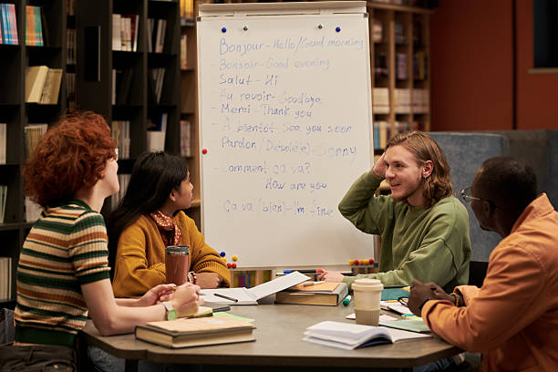 istock Multiethnic Young People Studying French Language Together in Library Setting 2249783117