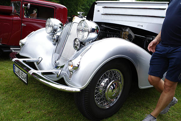 Black and beige colored vintage car partial view