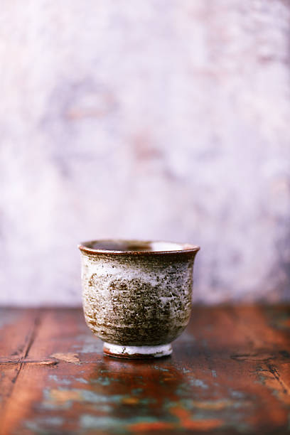 istock Traditional japanese ceramic on rustic wooden background. Soft focus. Copy space. 2249788743