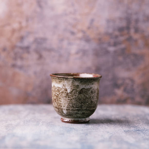 istock Traditional japanese ceramic on rustic wooden background. Soft focus. Copy space. 2249788944