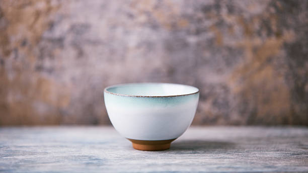 istock Traditional japanese ceramic on rustic wooden background. Soft focus. Copy space. 2249788949