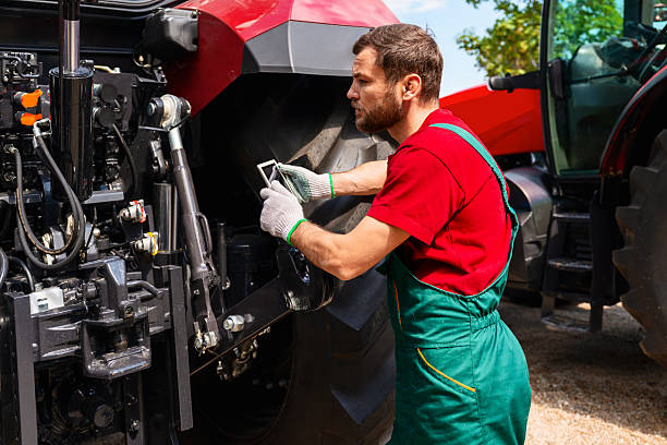 istock Agricultural equipment technician inspecting farm machines with digital tablet 2249788951