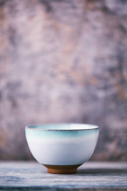 istock Traditional japanese ceramic on rustic wooden background. Soft focus. Copy space. 2249788976