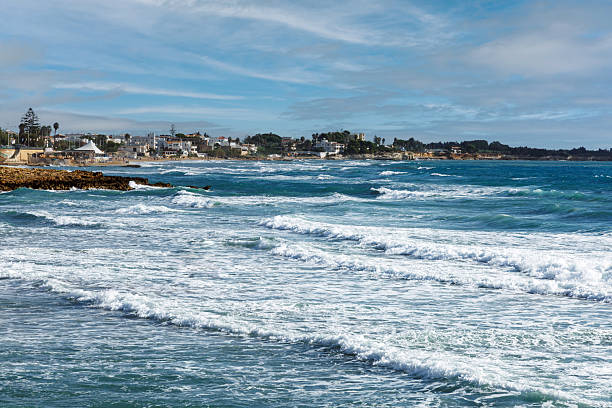 istock Sicilian seaside view with sunny Mediterranean waves 2249789343