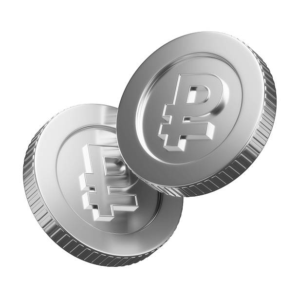 Two gleaming coins featuring the Russian Ruble symbol sit at an angle, symbolising digital currency, finance, and modern technology. Perfect for topics on finance, investment, and online payments.