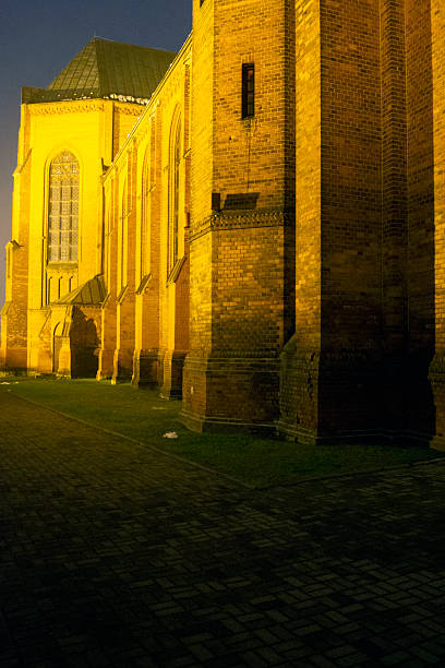 The historic neo-Gothic Church of St. Joachim in Sosnowiec's Zagórze district. Night view of the illuminated building.