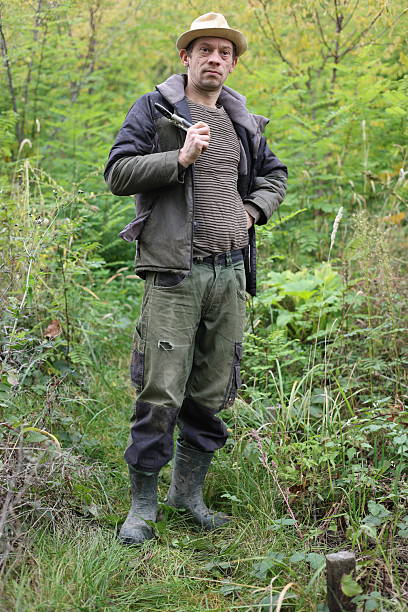 Farmer worker at own home, rural countryside man