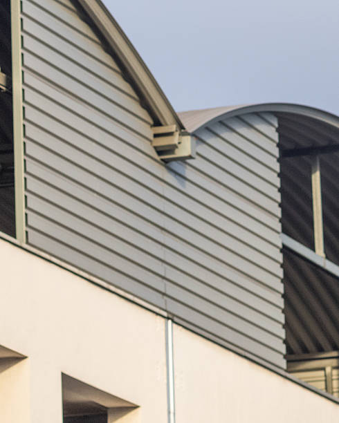 istock large industrial building with round metal roof 2249796352