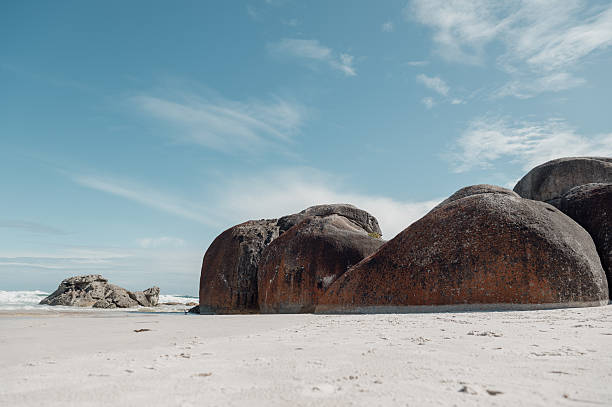 istock huge boulders on the beach 2249796374