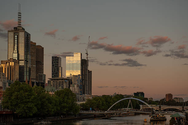 istock View across a river to a cityscape after sunset during the blue hour 2249797872