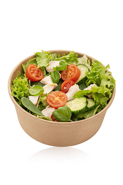 istock Salad with chicken and vegetables isolated on white background 2249798312
