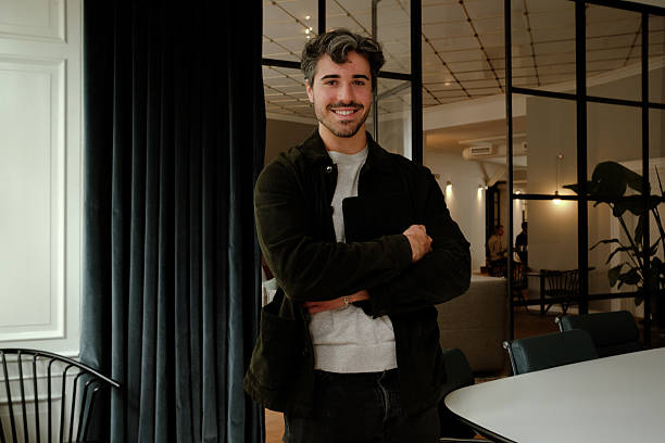 istock Confident Male Professional in Modern Office Environment – Startup and Creative Workspace Portrait 2249803252